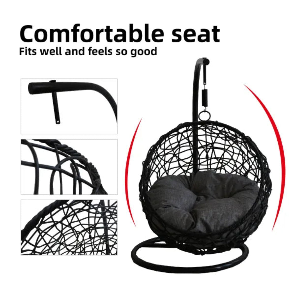 Black wicker hanging chair with a gray cushion on a white background