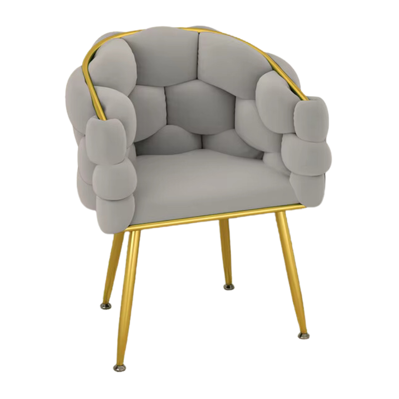 Gray armchair with gold legs on a white background