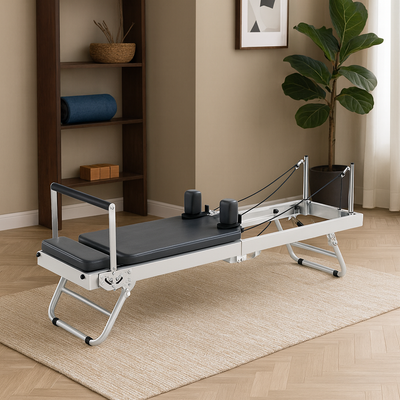 Foldable Steel–Frame Pilates Reformer (With Adjustable Height & Silent Resistance)