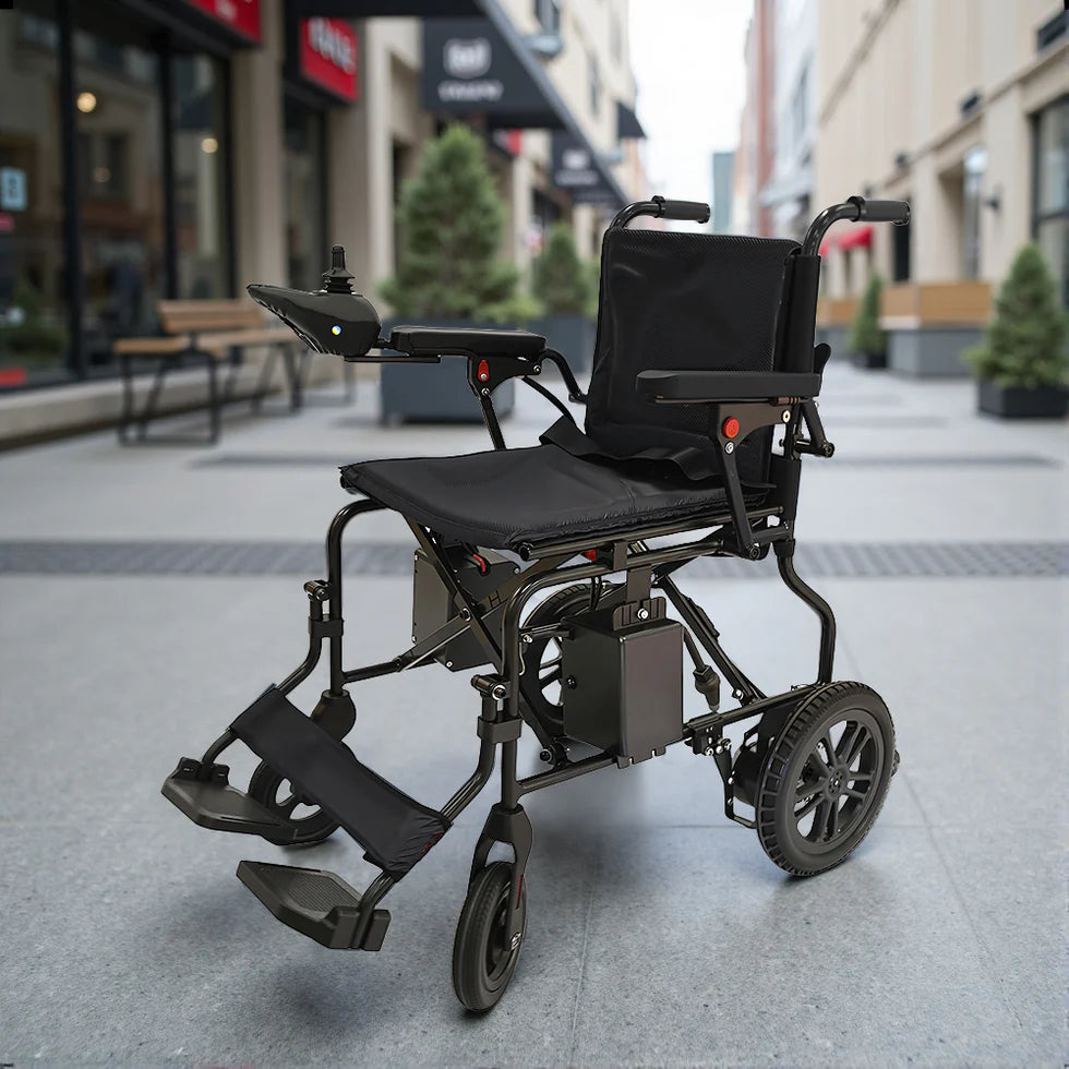 Foldable Electric Wheelchair – Dual Motor Mobility with 10–15km Range, Compact & Travel-Ready