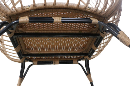 Close-up of a wicker chair with black metal frames on a white background