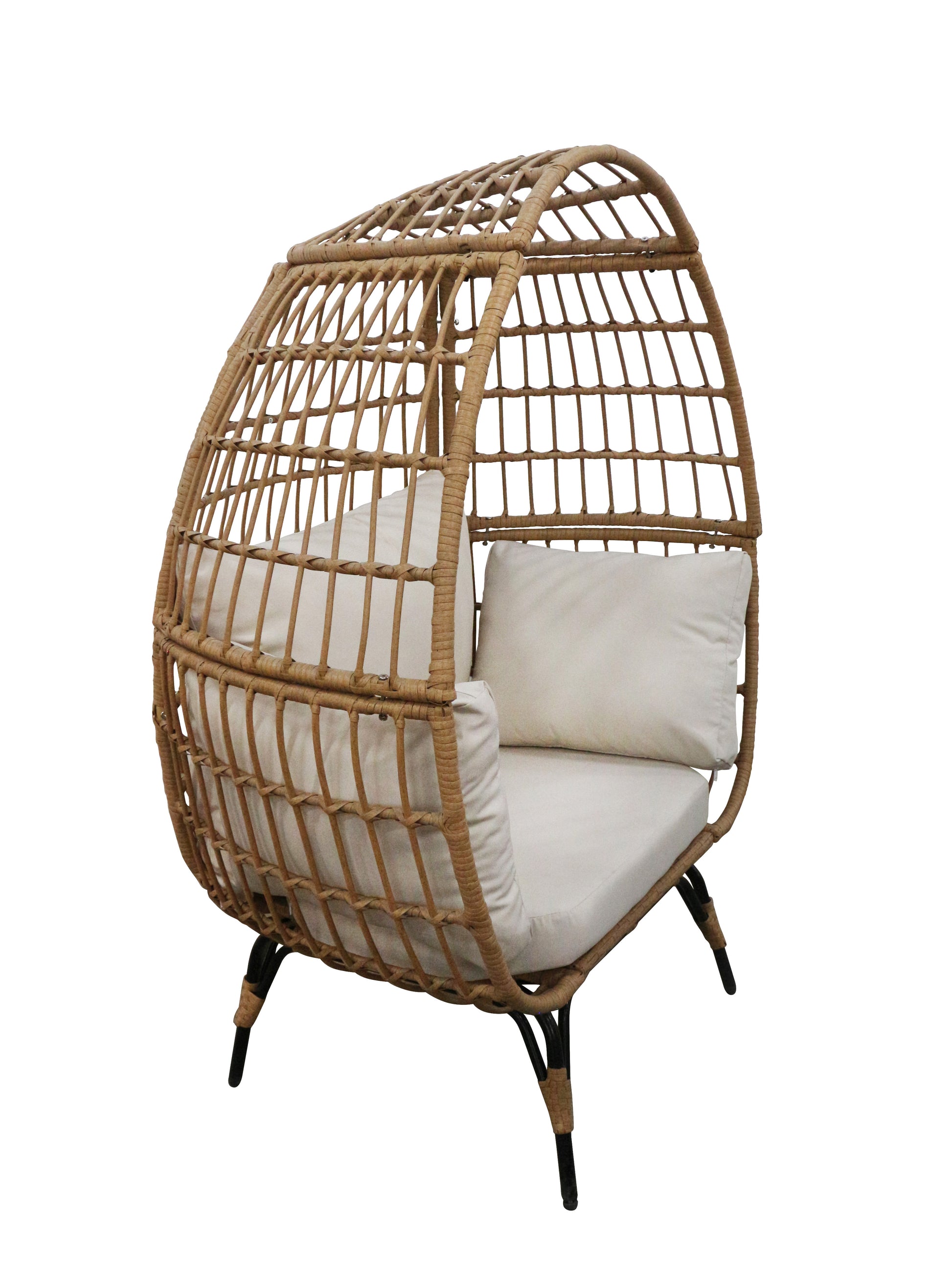 Wicker egg-shaped chair with white cushions on a white background