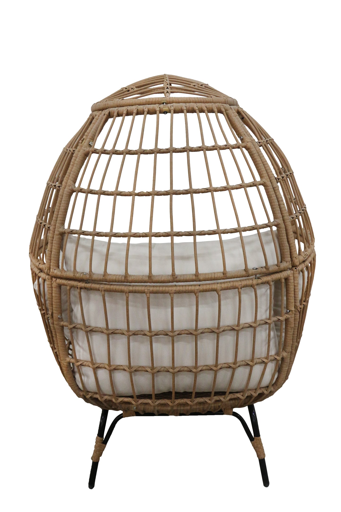 Wicker egg-shaped chair with a cushion on a white background