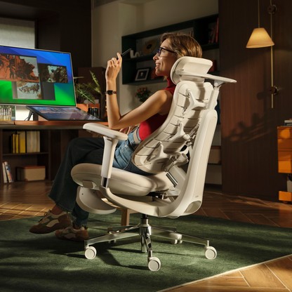 Hbada T8 Max white office chair in a home office, reclined with keel backrest visible
